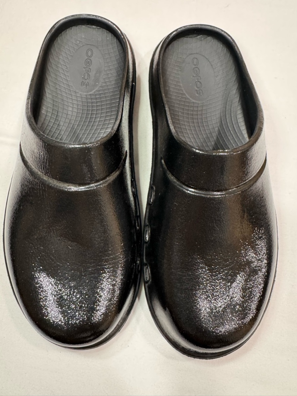 OOFOS Black Slip-On Clogs with Gloss Finish